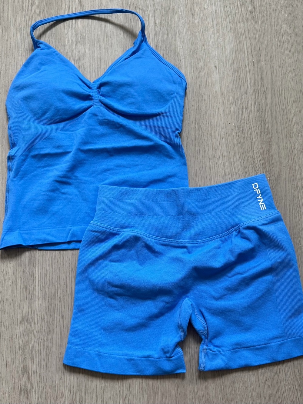 DFyne blue impact sports bra and shorts set